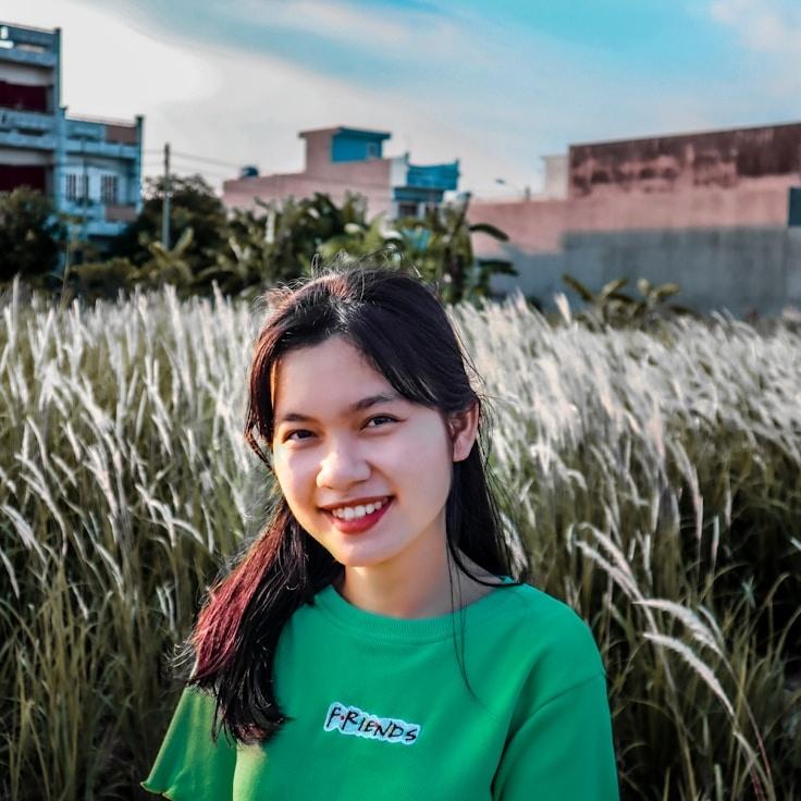 Alex Rivera, Lead Design Curator at Quiet Stream Framework, reviewing corporate floral arrangements