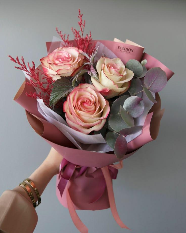 Professional floral arrangement in modern corporate setting